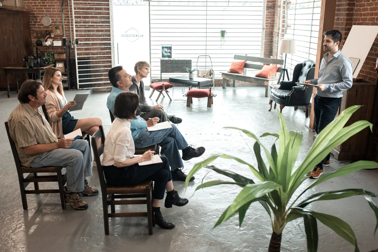 A senior professional working session representing Goodwind's collective model